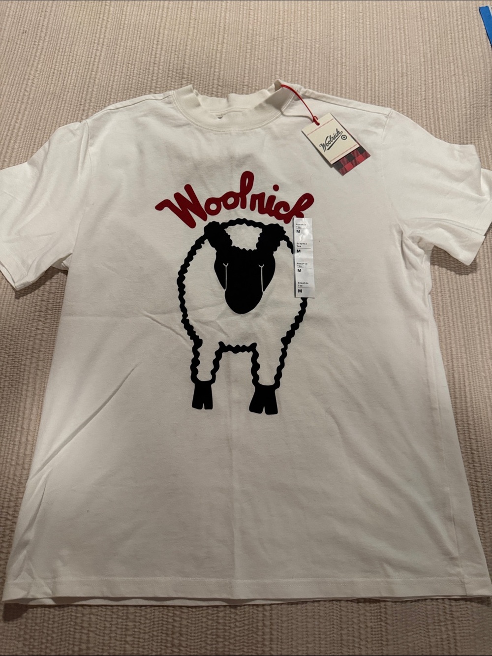 Woolrich Cream Short Sleeve Tee with Black Sheep and Red Logo